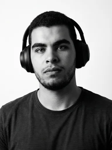 Alaa Adel wearing headphones